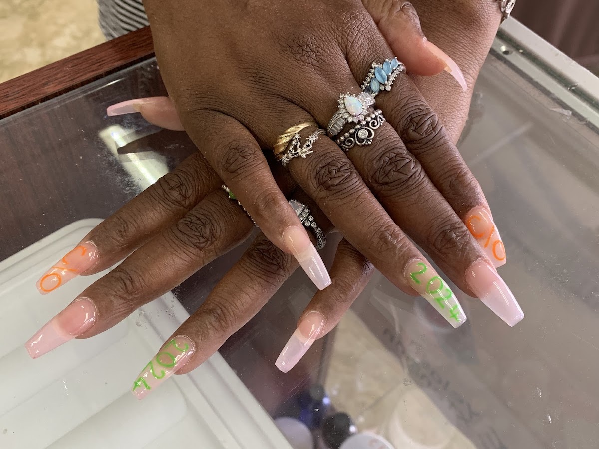 Nude-pink coffin nails with hand-painted lettering